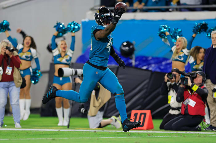 Jaguars linebacker Josh Allen scores the game-winning touchdown against the Titans in Week 18 to give Jacksonville the AFC South title.